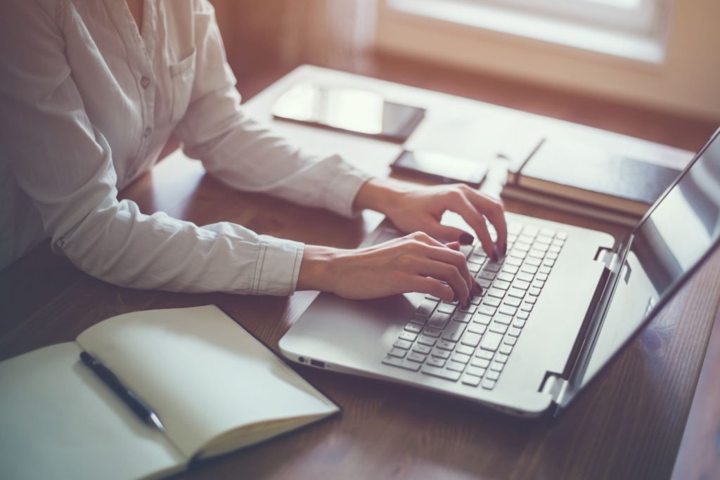 writer with laptop