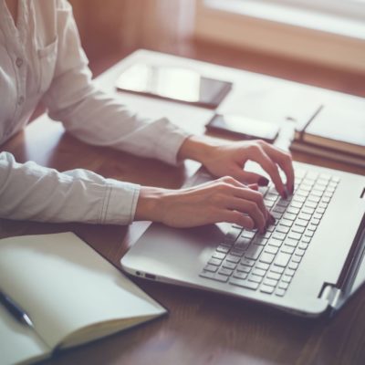 writer with laptop